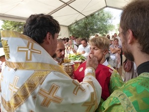 Eucaristía en la misa ortodoxa en honor San Serafín de Sarov